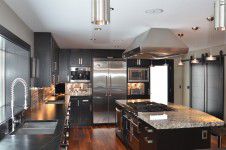 interior-decorators-chicago - Black cabinets with black soapstone kitchen for a modern kitchen designed by Runa Novak of In Your Space Interior Design - InYourSpaceHome.com and RunaNovak.com