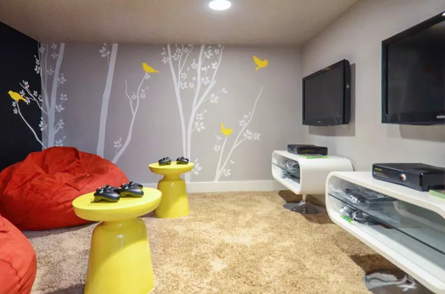 chicago-interior-decorators - A kid's media room in a secret room with chalkboard wall and bean bags designed by Runa Novak of In Your Space Interior Design - demo.mightymediatech.com and RunaNovak.com