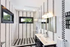 interior-designers-denver - Black and white modern bathroom with an open shower designed by Runa Novak of In Your Space Interior Design - demo.mightymediatech.com and RunaNovak.com