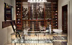 chicago-interiors - Hand blown crystal chandelier that looks like upside down Champaign glasses for a wine room designed by Runa Novak of In Your Space Interior Design - demo.mightymediatech.com and RunaNovak.com